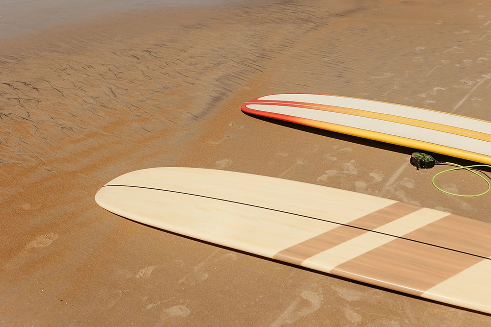 two-gun-surfboards-lying